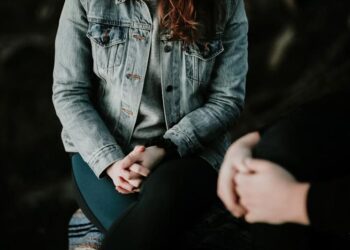 https://unsplash.com/photos/woman-in-denim-jacket-sitting-F9DFuJoS9EU
