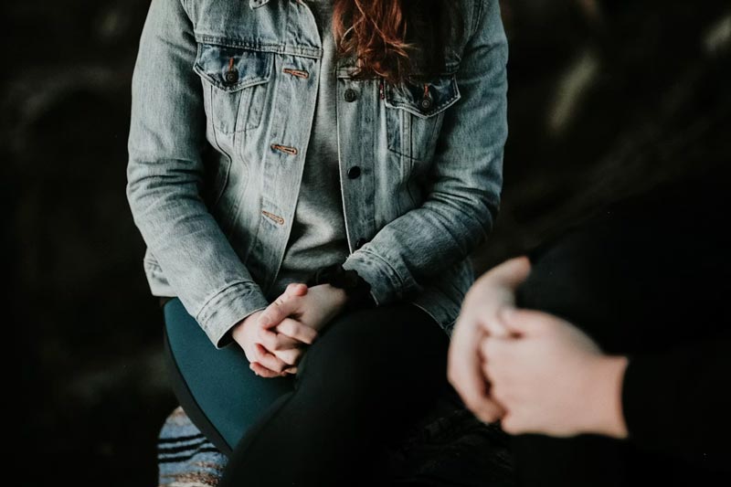 https://unsplash.com/photos/woman-in-denim-jacket-sitting-F9DFuJoS9EU